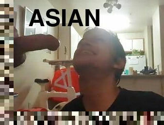 Asian Twink gets facial from white daddy cock