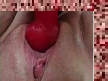 Wet pussy from using a dildo
