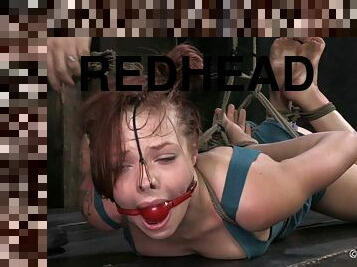 Tied up redhead slag gets her tight cunt poked with toys