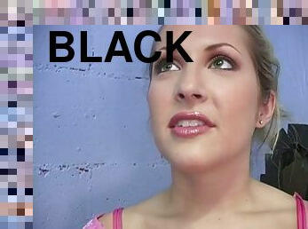 Chelsea Rae sucks and rubs a black wang at a gloryhole