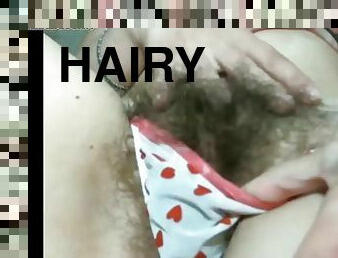 Hairy teen rubbing her sweet pussy