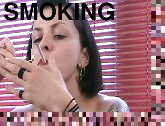 Hot woman smokes and talk in naughty way
