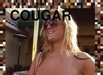 Fine looking cougar had an hidden agenda when she got spanked from behind as she licks another