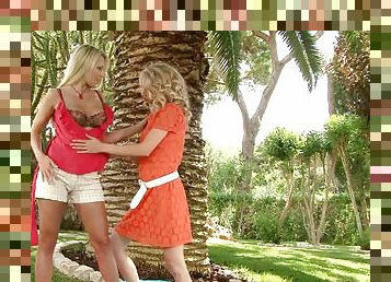 Two blond lusty sunbathers are having a hot lesbian sex