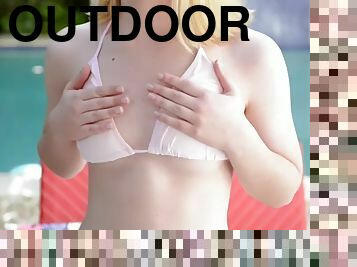 Submissive Maddie cums outdoors in a bikini.