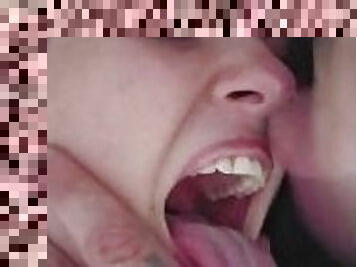 Her cute little mouth filled with cum