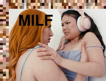 Redhead MILF fucks tiny asian teen