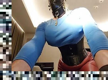 Big tits hooded sissy toy in tight corset
