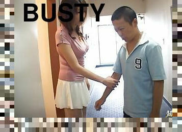 Busty Japanese pornstar takes a facial cumshot after blowing a hard boner