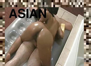 Hardcore Asian masseur with a hairy pussy stroking a white cock