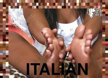 Foot fetish Italian solo model oiling her feet close up