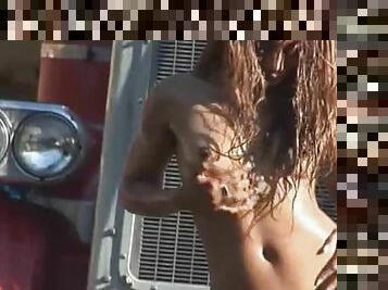 Sexy and naked Vilayna LaSalle washes a truck