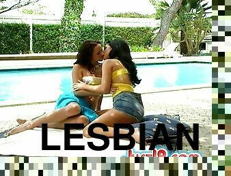 Instead of sunbathing these two lesbians hook up and play poolside