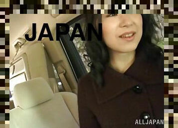 Arousing Japanese milf giving a spicy blowjob in the car