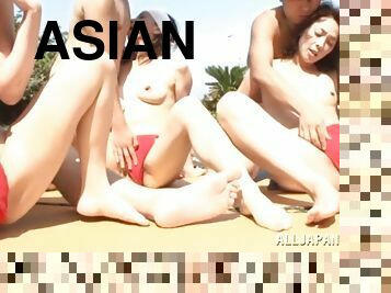 Horny Asian ladies are fucked in outdoors group sex scene