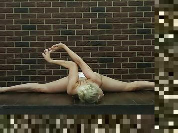 Fit blonde teen can bend her body in amazing ways