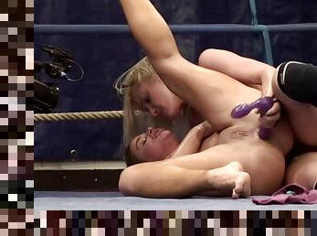 Sexy girls toy each others tight asses in the boxing ring