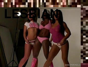 The models have some naked, interracial fun during a photo shoot