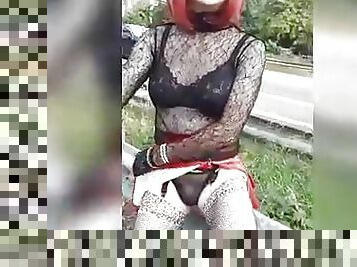 sissy in sexy outfit shows her clit by the ring road