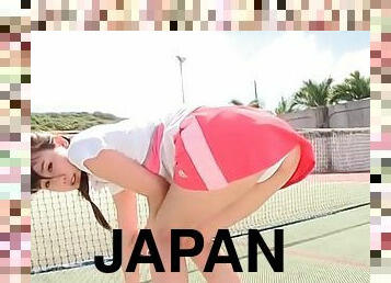 Sporty Japanese girl strips on tennis court