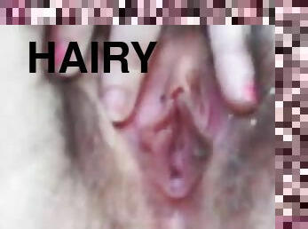 A Hairy Pussy Gets Masturbated In A Close Up Clip