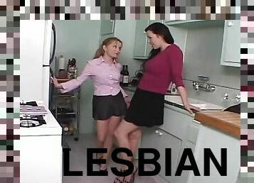 Two horny co-workers are having a hot lesbian sex in the kitchen