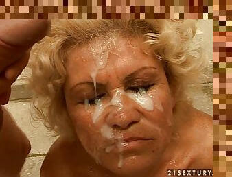 Old woman fucked by 3 dicks gets load of cum on her face