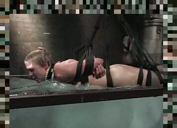 Horny blonde gets humiliated in water bondage vid by her mistress