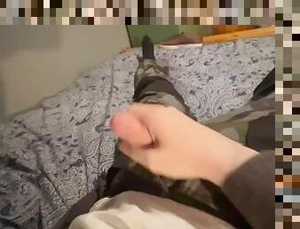 Horny boy in camo trousers jacks off and cums over himself