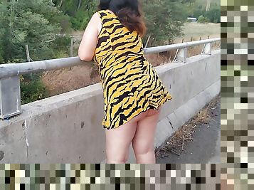 BBW walking outdoors in highway