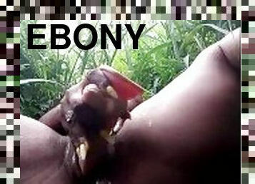 Village girl putting dildo in her vagina in the wild