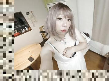 Japanese crossdresser cums while working with his hands in a summer dress