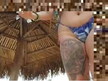 Tall tattooed babe in bikini