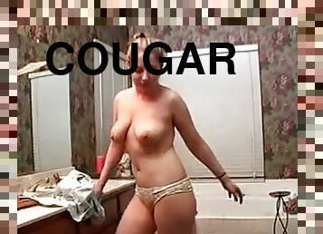 Chubby Cougar Is In The Tub And She Rubs Her Vagina