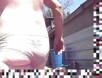 sexypantyman takes it outside for a walk in the garden hope ma don't find me taking the cock out!