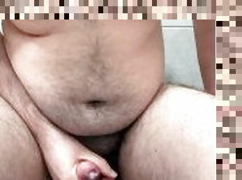 CHUBBY guy with PHIMOSIS shows his HAIRY BELLY while JERKING OFF