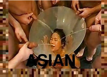 Nasty Asian Gets Fucked Hard and Pissed all Over Her Face By Several Dudes