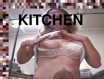 Girls undress in the kitchen of a nightclub