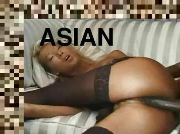 Asian is hot in stockings as she takes black cock