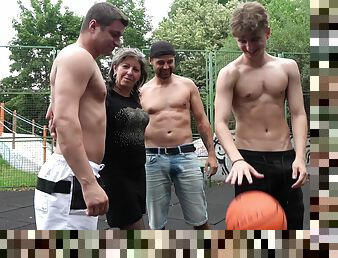 Amateur granny gets fucked in gangbang on the basketball court