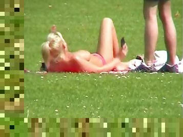 Video of a chick topless in the park