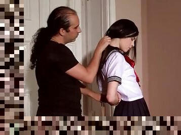 He puts submissive schoolgirl into rope bondage