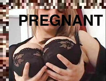 Pregnant girl with huge tits uses toy