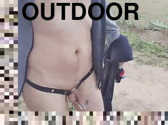Outdoor walk and pee locked in chastity device with urethral plug