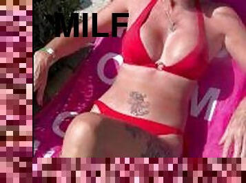 Sunbathing bikini milf