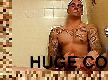 Tattooed jocks shower masturbation jizzing in condom