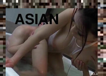 Curvy Asian in the bathhouse sucks dick and fucks two guys
