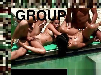 Two hot girls getting pounded by the pool