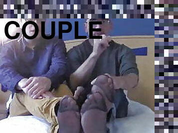 LATIN COUPLE SHOW OFF BIG MEATY FEET IN SHEER SOCK