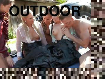 Closeup outdoor groupsex with pissing babes